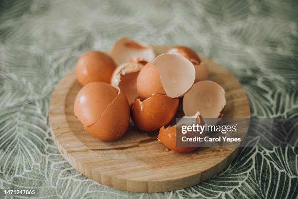 eggs on dinner table - eggshell stock pictures, royalty-free photos & images