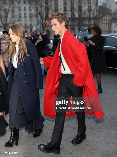 Eddie Redmayne and Hannah Bagshawe attend the Alexander McQueen Womenswear Fall Winter 2023-2024 show as part of Paris Fashion Week on March 04, 2023...