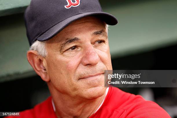 Manager Bobby Valentine of the Boston Red Sox looks on from the dugout during the first inning of the interleague game against the Atlanta Braves at...