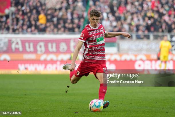 Arne Engels of Augsburg shoots the ball during the Bundesliga match between FC Augsburg and SV Werder Bremen at WWK-Arena on March 4, 2023 in...