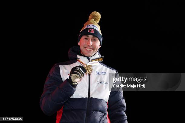 Gold medalist Jarl Magnus Riiber of Norway poses for a photo during the medal ceremony for Nordic Combined Men's Gundersen Large Hill HS138/10km at...