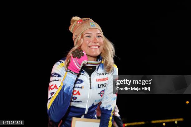 Bronze medalist Frida Karlsson of Sweden poses for a photo during the medal ceremony for Cross-Country Women's 30km Mass Start Classic at the FIS...
