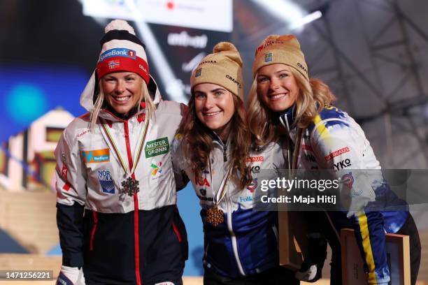 Silver medalist Anne Kjersti Kalvaa of Norway, gold medalist Ebba Andersson of Sweden and bronze medalist Frida Karlsson of Sweden pose for a photo...