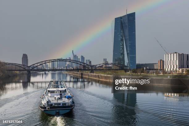 ecb tower and skyline of frankfurt/ main with rainbow, germany - europäische zentralbank stock-fotos und bilder