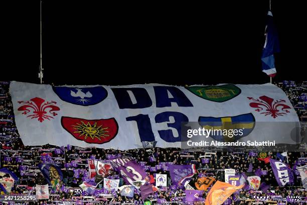 Fiorentina fans in memory of late player Davide Astori during the Serie A match between ACF Fiorentina and AC MIlan at Stadio Artemio Franchi on...