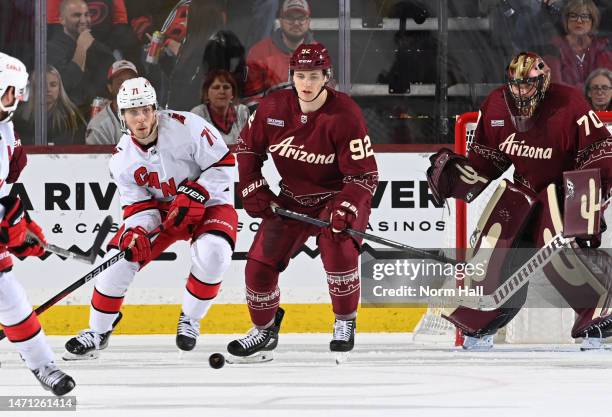 Vladislav Kolyachonok of the Arizona Coyotes skates with the puck against the Carolina Hurricanes at Mullett Arena on March 03, 2023 in Tempe,...