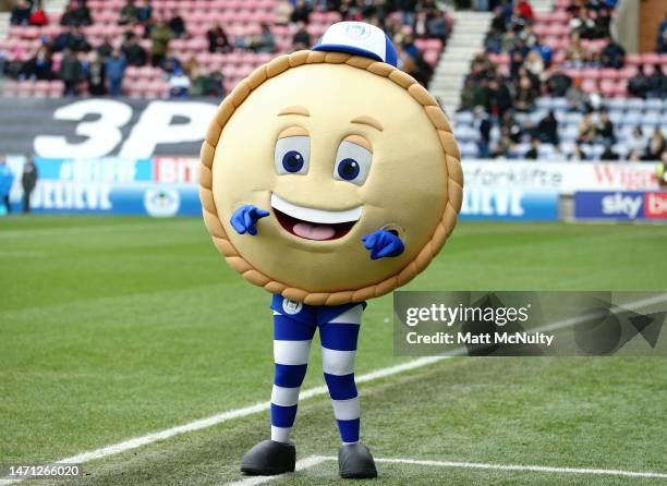 Wigan Athletic mascot, Crusty the Pie during the Sky Bet Championship between Wigan Athletic and Birmingham City at DW Stadium on March 04, 2023 in...
