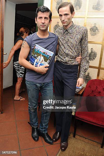 Andre Saraiva and Christopher Niquet attend Officiel Hommes Paris Dinner on June 25, 2012 in Milan, Italy.