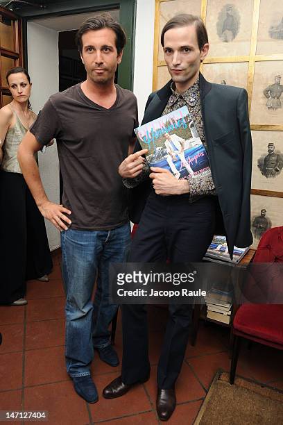 Carlo Mazzoni and Christopher Niquet attend Officiel Hommes Paris Dinner on June 25, 2012 in Milan, Italy.