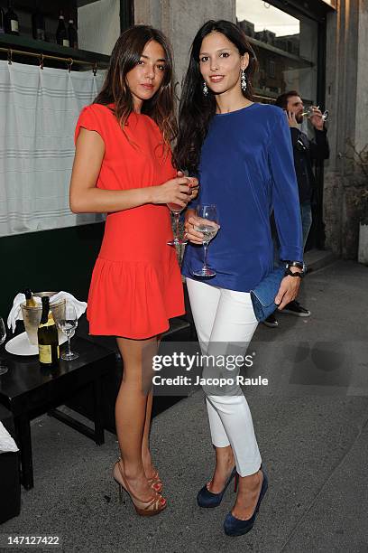 Valentina Scambia and Natalie Dompe attend Officiel Hommes Paris Dinner on June 25, 2012 in Milan, Italy.