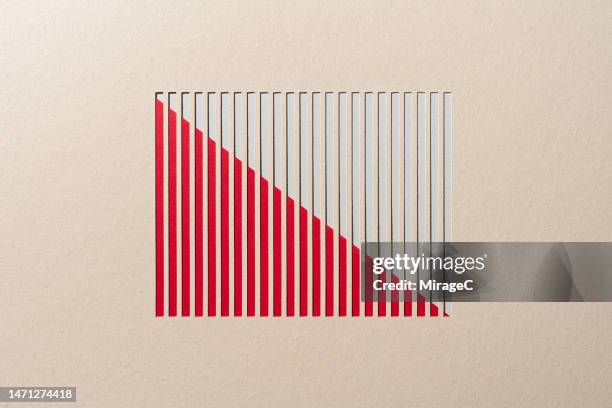 descending red bar chart moving down paper cut craft - balkendiagramm stock-fotos und bilder