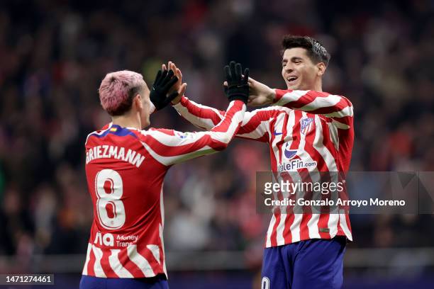 Alvaro Morata of Atletico de Madrid celebrates after scoring their fifth side goal with Antoine Griezmann during the LaLiga Santander match between...