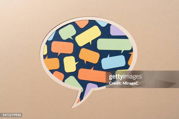 large speech bubble contains small speech bubbles, paper craft - speech bubbles stock pictures, royalty-free photos & images