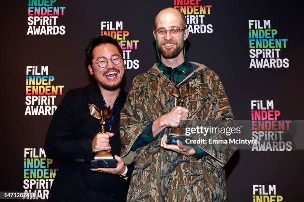 Dan Kwan and Daniel Scheinert winners of the Best Screenplay award for “Everything Everywhere All at Once” pose in the press room during the 2023...