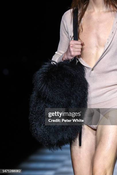 Model, bag detail, walks the runway during the Ann Demeulemeester Womenswear Fall Winter 2023-2024 show as part of Paris Fashion Week on March 04,...