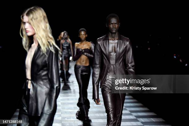 Models walk the runway during the Ann Demeulemeester Womenswear Fall Winter 2023-2024 show as part of Paris Fashion Week on March 04, 2023 in Paris,...