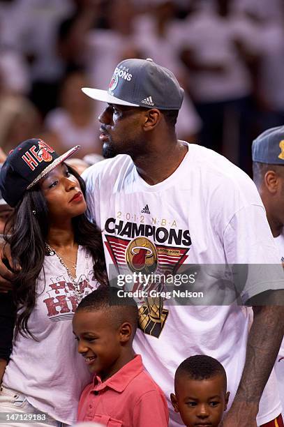 Finals: Miami Heat LeBron James victorious with wife Savannah and sons LeBron Jr. And Bryce after winning game and series vs Oklahoma City Thunder at...