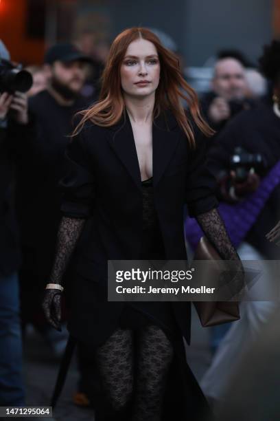 Camille Razat seen wearing a black blazer, black skirt and black transparent tights outside Victoria Beckham, during Pariser Fashion Week on March...