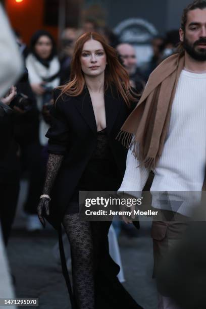 Camille Razat seen wearing a black blazer, black skirt and black transparent tights outside Victoria Beckham, during Pariser Fashion Week on March...