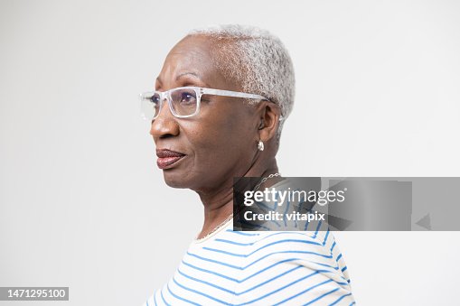 Senior Black Woman Wearing White Glasses