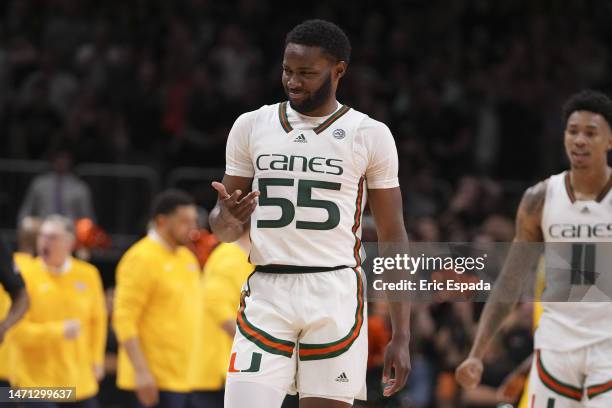 Wooga Poplar of the Miami Hurricanes reacts after hitting a three point shot during the first half against the Pittsburgh Panthers at Watsco Center...