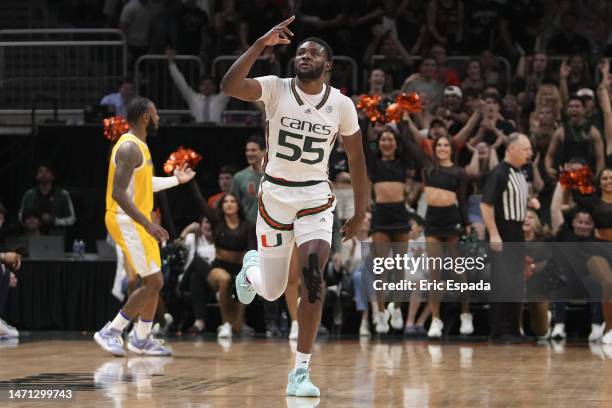 Wooga Poplar of the Miami Hurricanes reacts after hitting a three point shot during the first half against the Pittsburgh Panthers at Watsco Center...