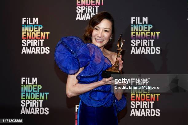Michelle Yeoh, winner of the Best Lead Performance award for “Everything Everywhere All at Once” poses in the press room during the 2023 Film...