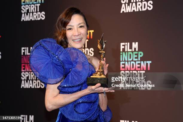 Michelle Yeoh, winner of the Best Lead Performance award for “Everything Everywhere All at Once”, poses in the press room during the 2023 Film...