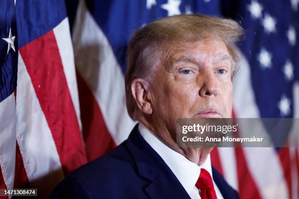 Former U.S. President Donald Trump speaks to reporters before his speech at the annual Conservative Political Action Conference at Gaylord National...