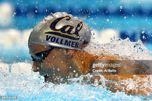 Dana Vollmer competes in the second semifinal heat of the Women's 100 m Butterfly during the 2012 U.S. Olympic Swimming Team Trials at CenturyLink...