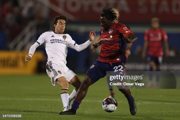 Emmanuel Twumasi of FC Dallas and Riqui Puig of LA Galaxy battle for the ball during the MLS game between LA Galaxy and FC Dallas at Toyota Stadium...