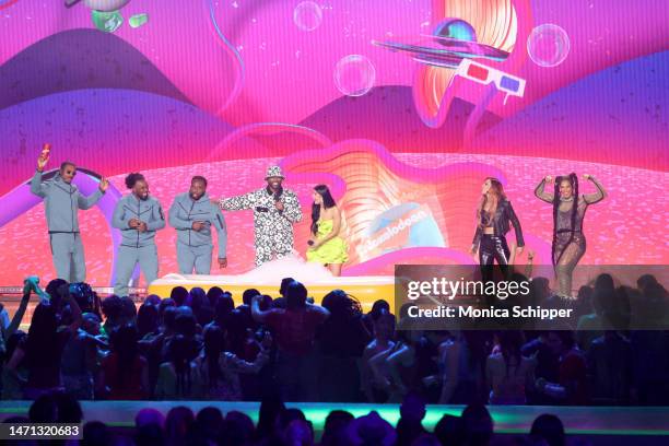 Kofi Kingston, Xavier Woods, Big E, Nate Burleson, Charli D'Amelio, Becky Lynch, and Bianca Belair speak onstage during the 2023 Nickelodeon Kids'...