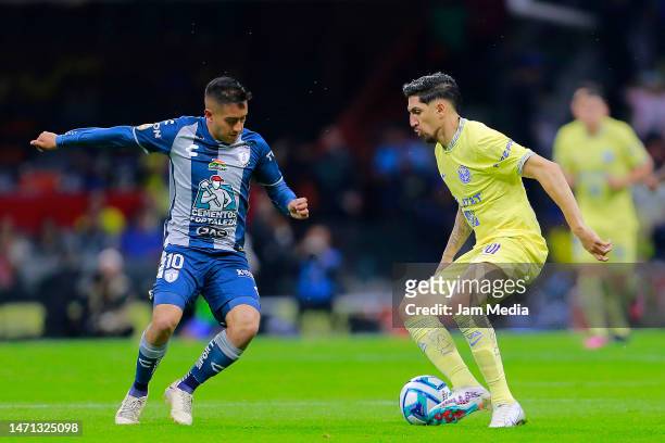 Erick Sanchez of Pachuca fights for the ball with Diego Valdes of America during the 10th round match between America and Pachuca as part of the...