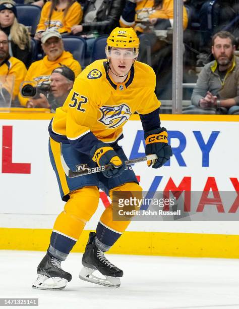 Cal Foote of the Nashville Predators skates against the Pittsburgh Penguins during an NHL game at Bridgestone Arena on February 28, 2023 in...