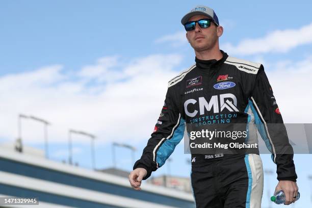 Ryan Sieg, driver of the CMRroofing.com Ford, walks onstage during driver intros prior to the NASCAR Xfinity Series Alsco Uniforms 300 at Las Vegas...