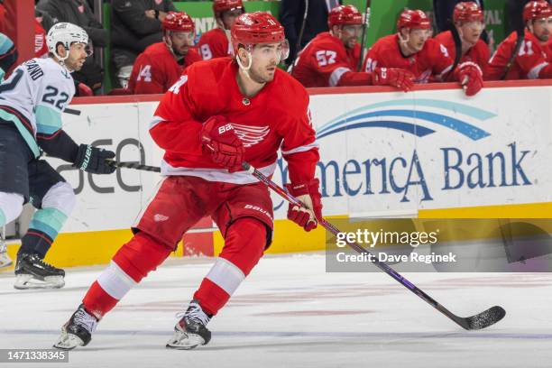 Filip Zadina of the Detroit Red Wings follows the play against the Seattle Kraken during the first period of an NHL game at Little Caesars Arena on...