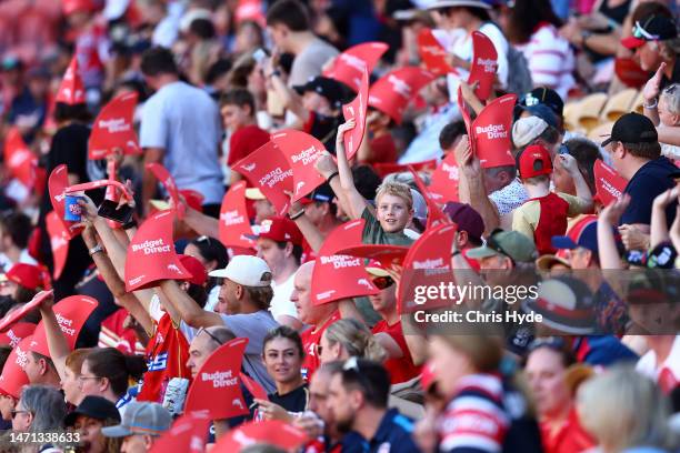 Dolphins fans cheer ahead of the round one NRL match between the Dolphins and Sydney Roosters at Suncorp Stadium on March 05, 2023 in Brisbane,...