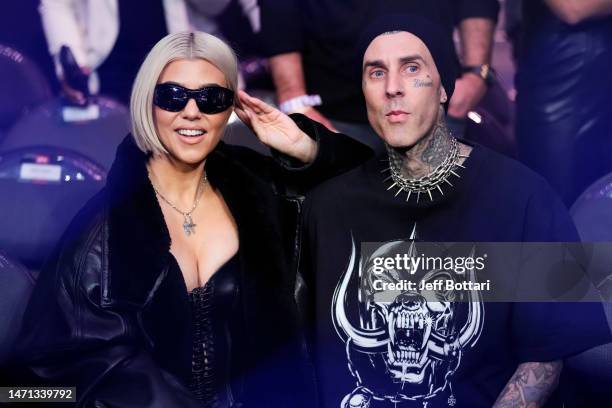 Kourtney Kardashian and Travis Barker attend the UFC 285 event at T-Mobile Arena on March 04, 2023 in Las Vegas, Nevada.