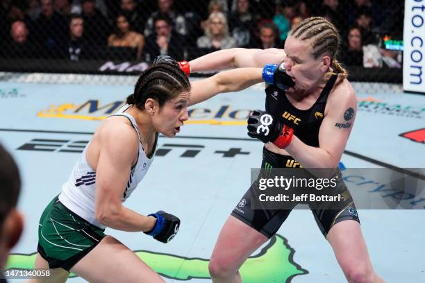 Alexa Grasso of Mexico punches Valentina Shevchenko of Kyrgyzstan in the UFC flyweight championship fight during the UFC 285 event at T-Mobile Arena...