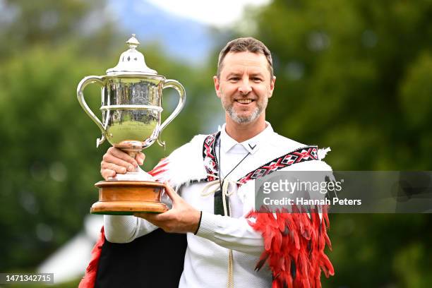 Brendan Jones of Australia celebrates with the trophy after winning the 2023 New Zealand Open during day four of the 2023 New Zealand Open at...