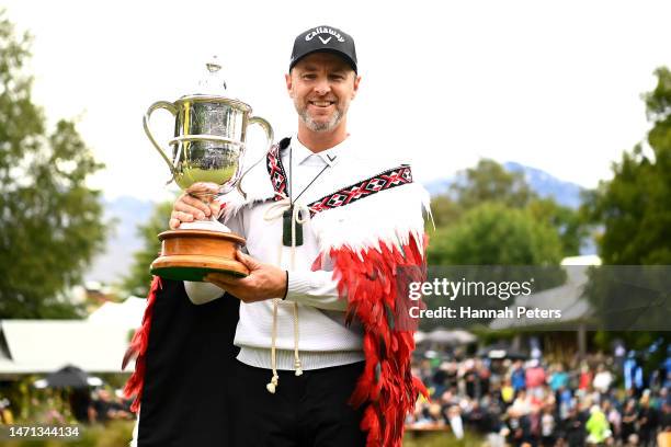 Brendan Jones of Australia celebrates with the trophy after winning the 2023 New Zealand Open during day four of the 2023 New Zealand Open at...