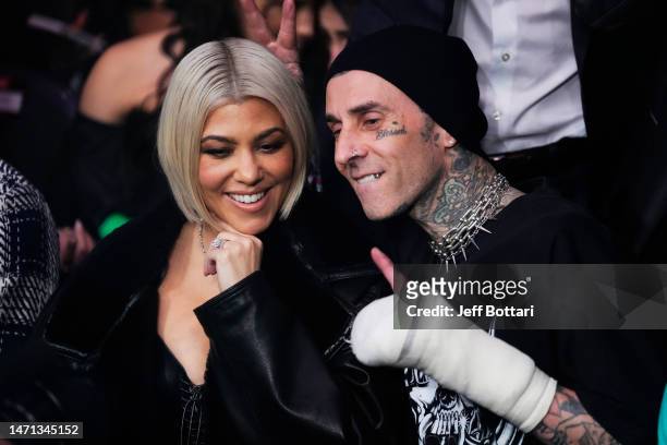 Kourtney Kardashian and Travis Barker attend the UFC 285 event at T-Mobile Arena on March 04, 2023 in Las Vegas, Nevada.
