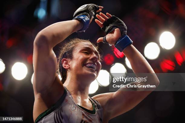 Alexa Grasso of Mexico reacts to her win over Valentina Shevchenko of Kyrgyzstan in the UFC flyweight championship fight during the UFC 285 event at...