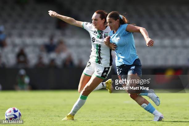 Kirsty Fenton of Sydney FC competes for the ball against Hannah Keane of Western United during the round 10 A-League Women's match between Sydney FC...