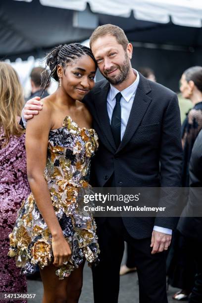 Ayo Edebiri and Ebon Moss-Bachrach attend the 2023 Film Independent Spirit Awards on March 04, 2023 in Santa Monica, California.