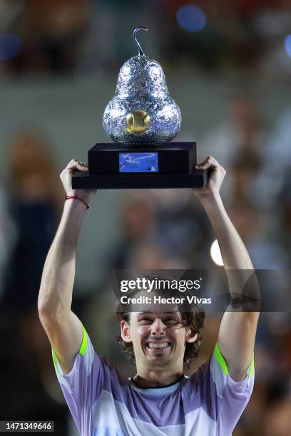 Álex de Miñaur of Australia poses with the champion trophy after winning the Final match against Tommy Paul of United States as part of the Telcel...