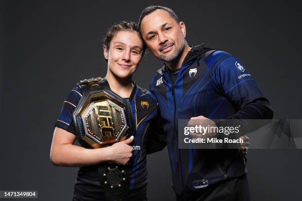 Alexa Grasso of Mexico and her coach poses for a portrait after her victory during the UFC 285 event at T-Mobile Arena on March 04, 2023 in Las...