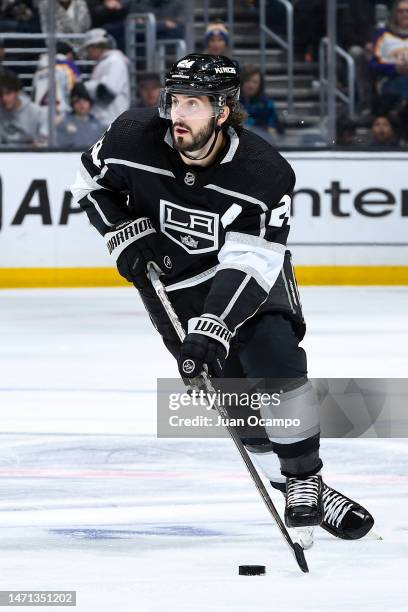 Phillip Danault of the Los Angeles Kings skates with the puck during the third period against the St. Louis Blues at Crypto.com Arena on March 4,...