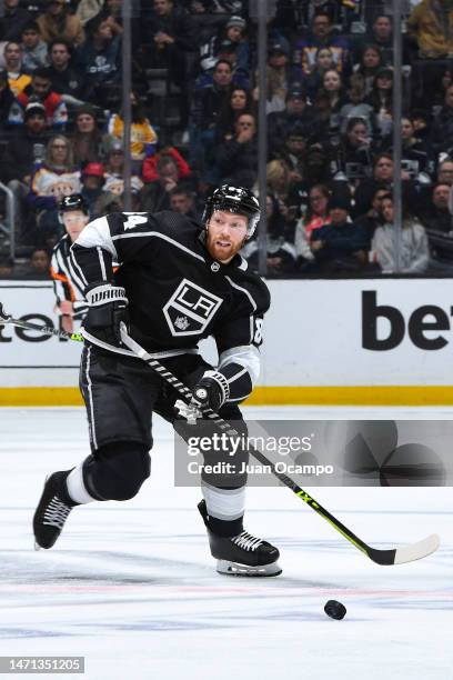 Vladislav Gavrikov of the Los Angeles Kings skates with the puck during the third period against the St. Louis Blues at Crypto.com Arena on March 4,...