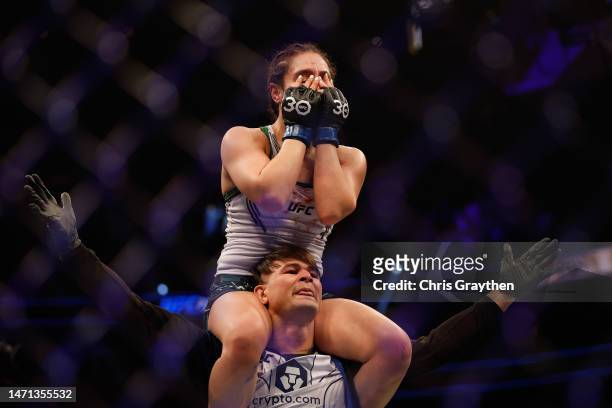 Alexa Grasso of Mexico reacts to her win over Valentina Shevchenko of Kyrgyzstan in the UFC flyweight championship fight during the UFC 285 event at...
